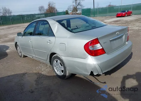 2002 Toyota Camry Le V6 z USA, uszkodzony, nr VIN 4T1BF30K32U020745